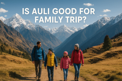 A happy family enjoying snowfall and scenic mountain views during their best family trip to Auli.